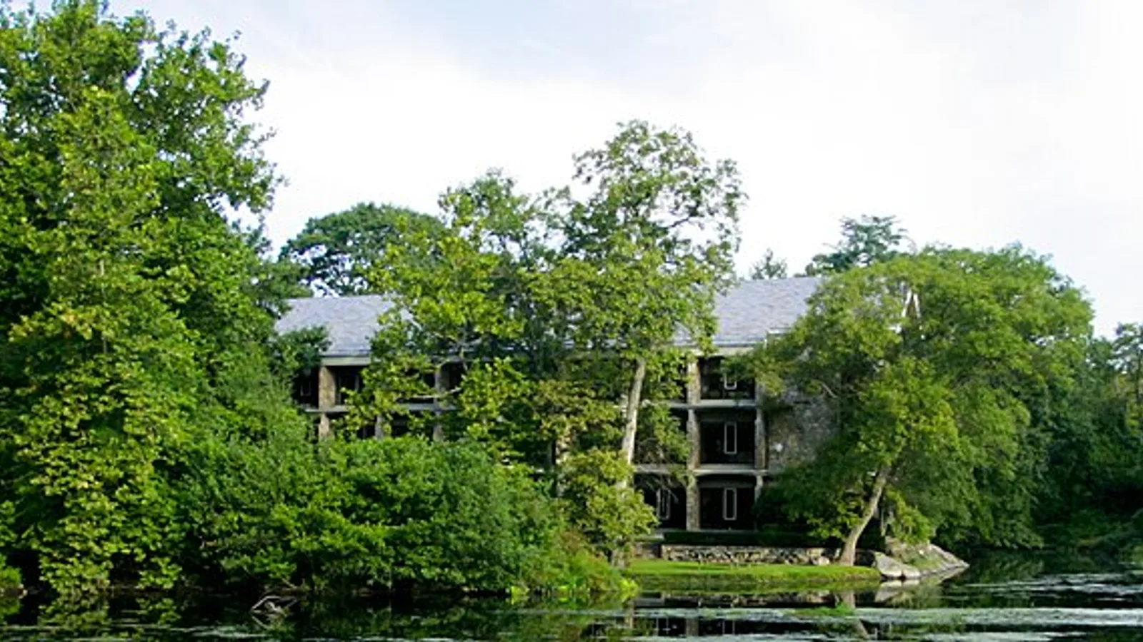 Panoramic view over the water towards the Bridgewater Associates' campus