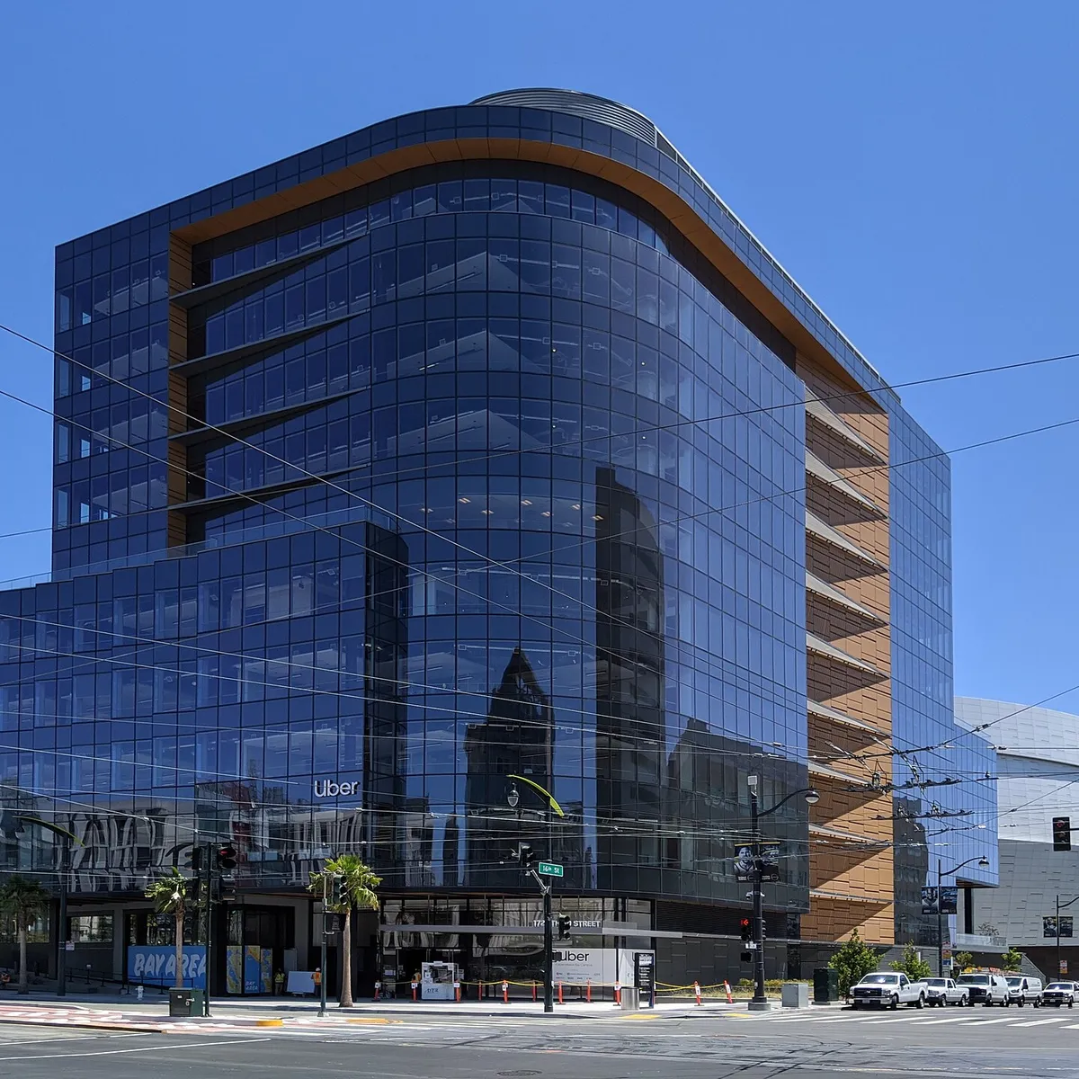 Offices of Uber at the intersection of 3rd Street and 16th Street in San Francisco's Mission Bay neighborhood. Part of the company's (then) new headquarters. The Chase Center is visible in the backgro
