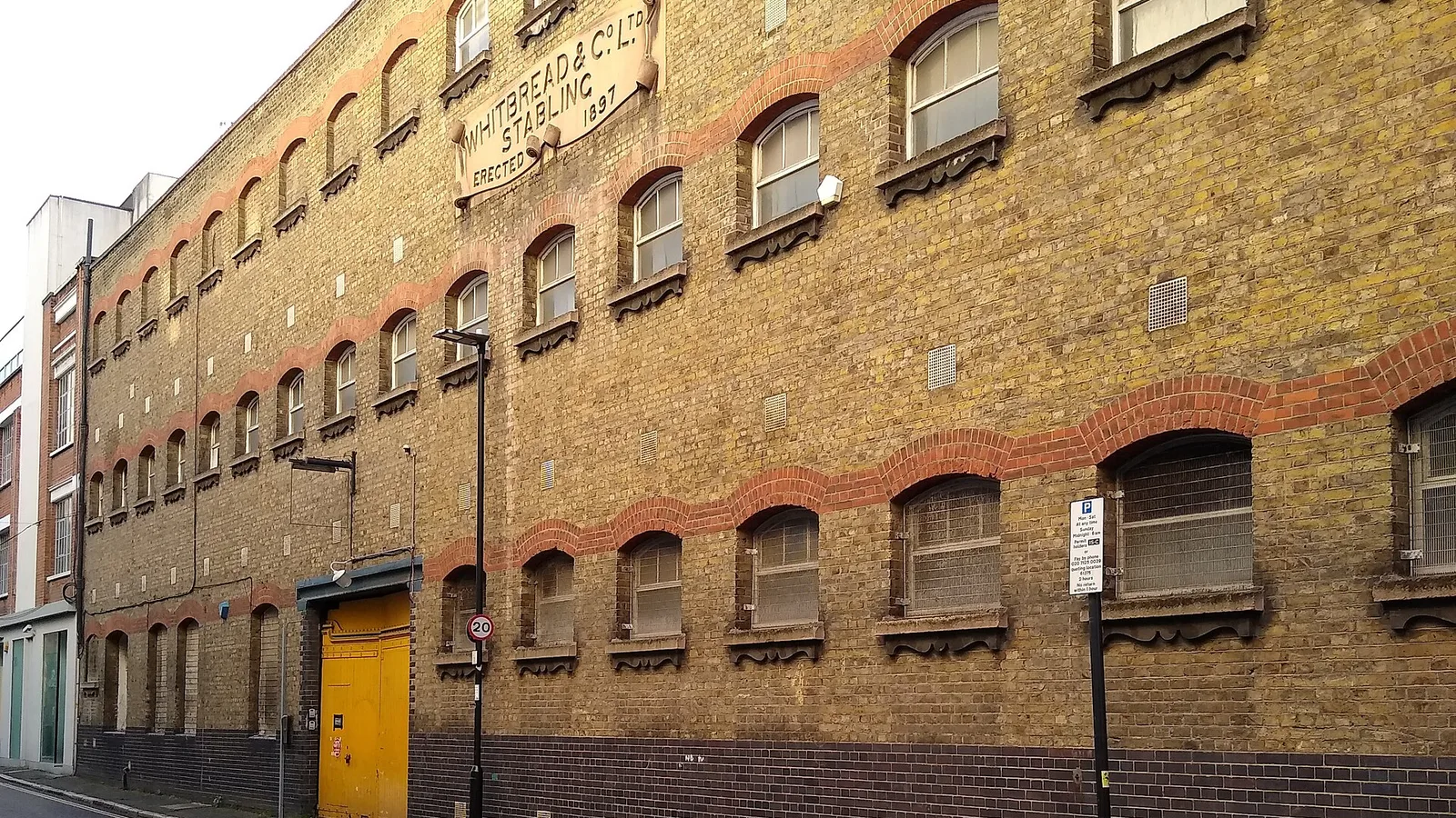 Whitbread's Stables ("Whitbread & Co. Ltd. Stabling Erected 1897"), a historic building in London. .mw-parser-output .messagebox{margin:4px 0;width:auto;border-collapse:collapse;border:2px solid var(-